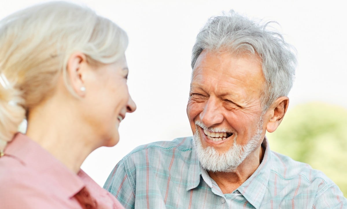 Elison Park | Senior man and woman smiling outside