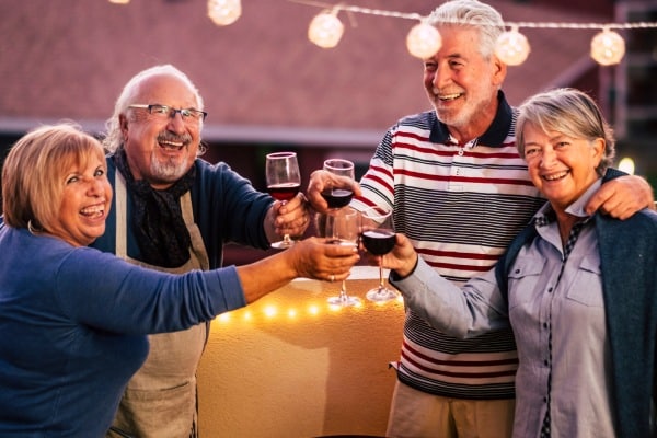 Elison Park | Seniors celebrating on a patio