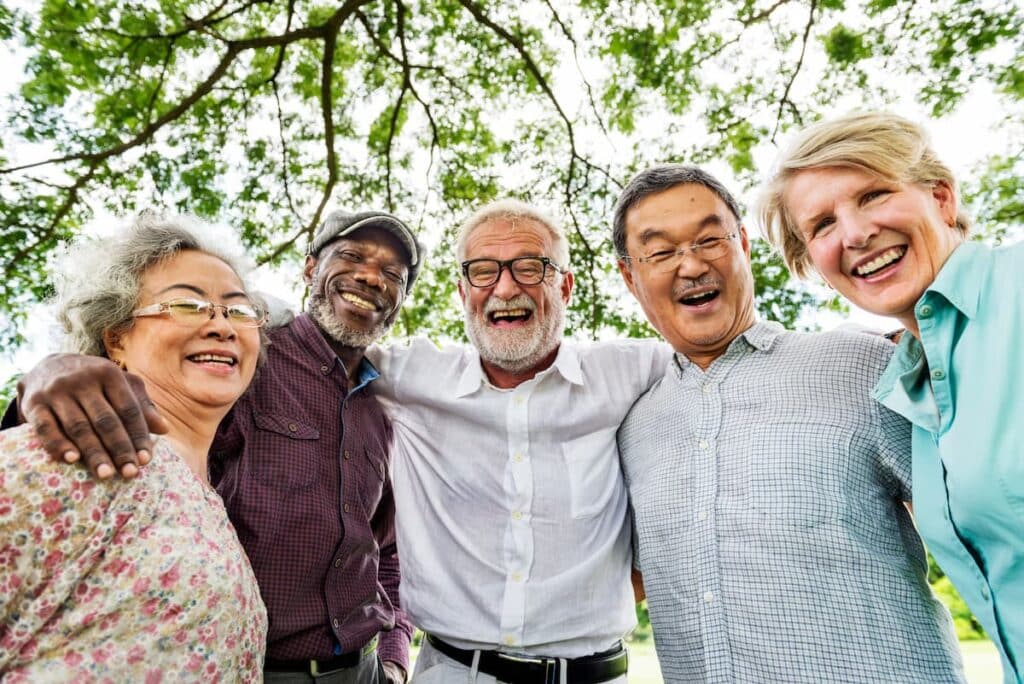 Elison Park | Seniors smiling and embracing each other