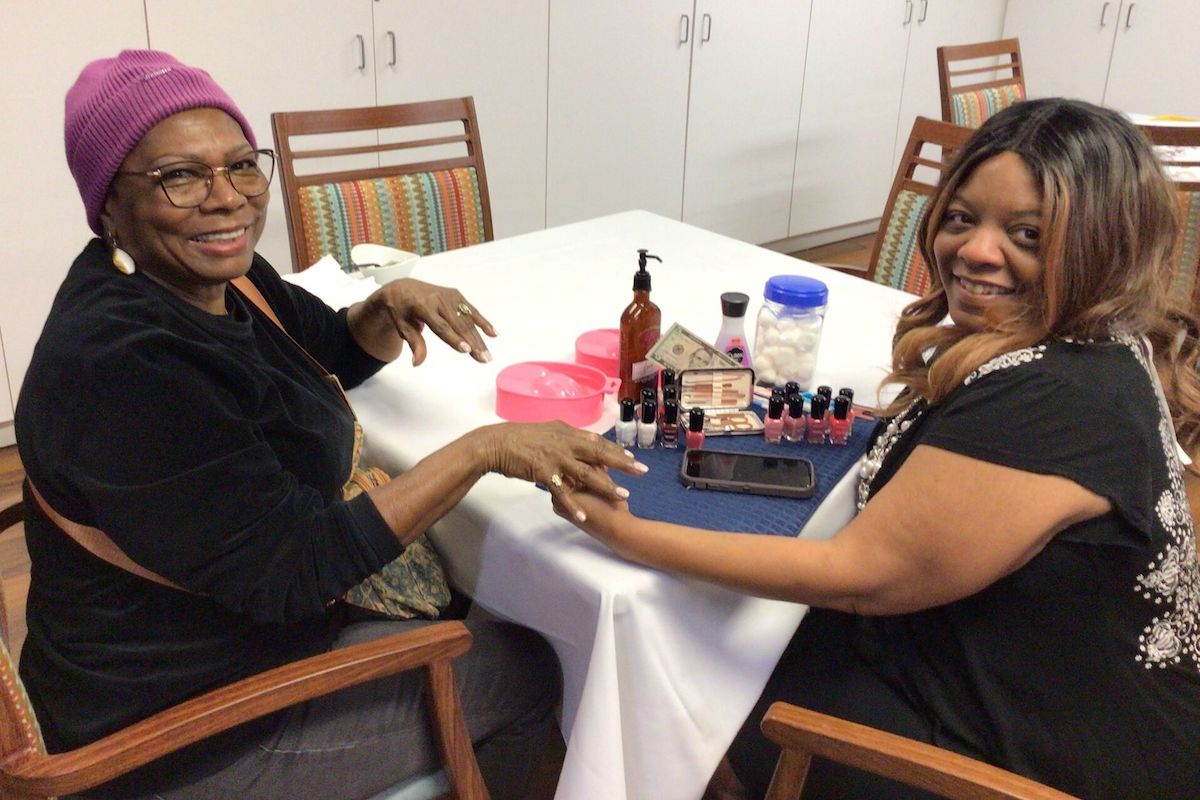 Elison Park Indpendent Living | Independent Living residents in Cypress getting a manicure